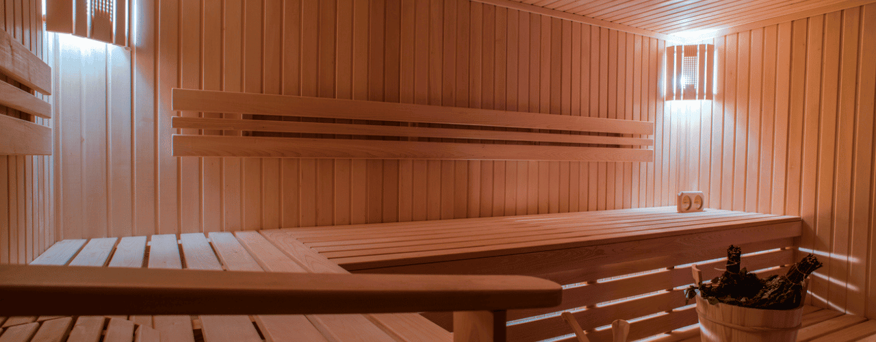 home sauna and steam room designed as a bespoke residential wellness suite